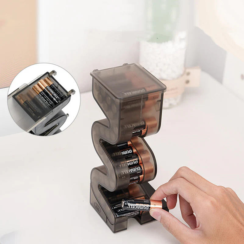 Magnetic battery tester and storage case suitable for AA and AAA batteries.